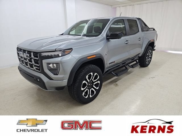 2026 GMC Canyon AT4 in Sterling Metallic — front three-quarter view